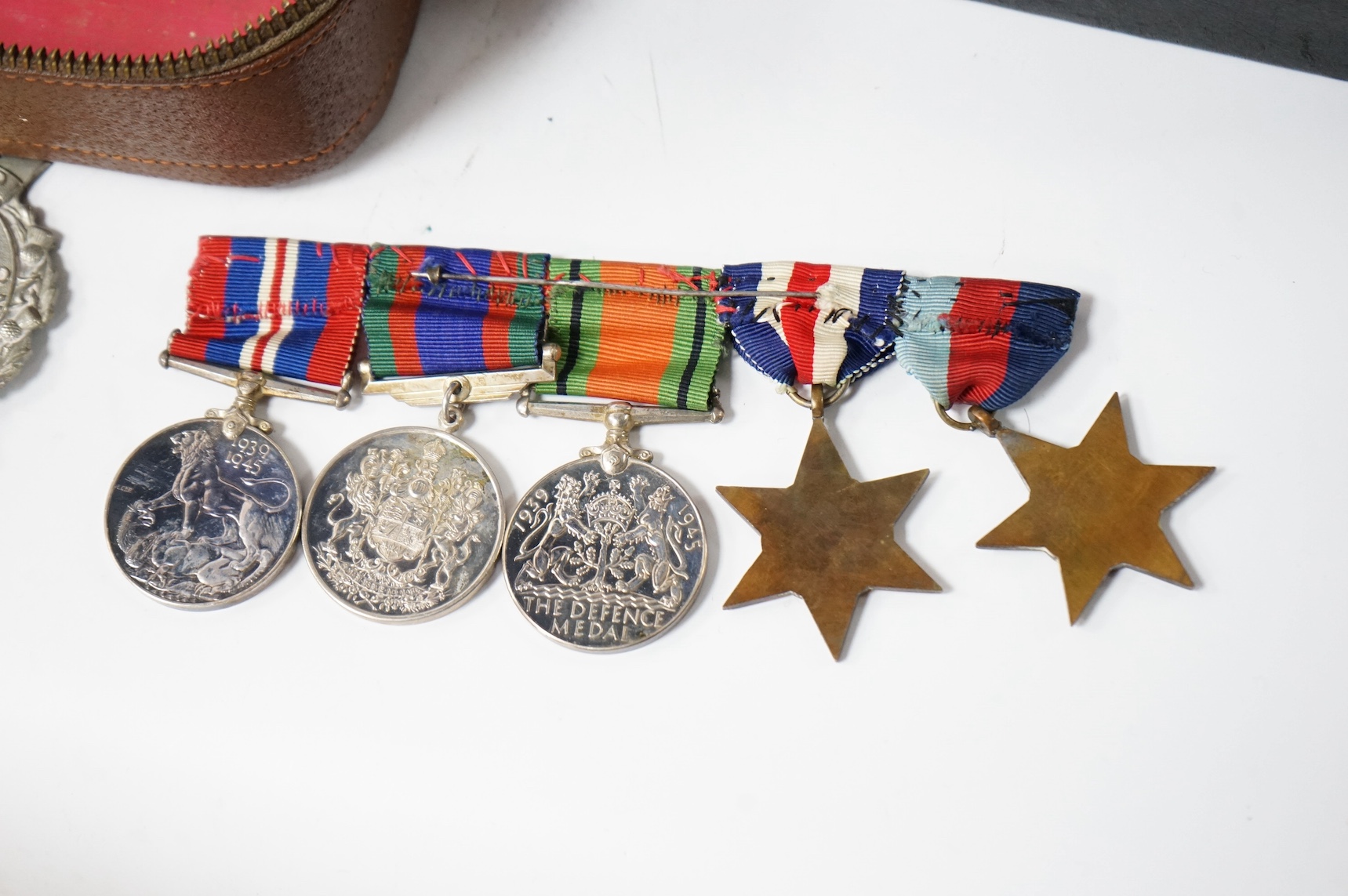 A WWII Canadian medal group awarded to E.B. Ash, a member of the Toronto Scottish Regiment, comprising of the 1939-1945 Star, the France and Germany Star, the Defence Medal, the 1939-1945 Canada Voluntary Service Medal w